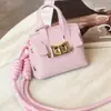 Nuevo Colgante de Bolso Mini Versátil de Platino Llavero de Cuerda Trenzada Multifuncional Portátil para Bolsos Venta al por Mayor