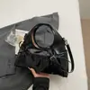 Bolso de Muñeca Coreano de Nicho para Mujer Verano 2026 Nuevo Casual Diseño de Nicho Bolso de Hombro Cruzado Bolso de Mano Bolso Dumpling