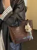 Bolso de hombro de moda para mujer Yuezhi 2026 principios de otoño, bolso tote de gran capacidad para el trabajo, bolso para mujer para la escuela