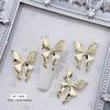 Joyería para Uñas con Diseño de Mariposa Dorada Explosiva Lujo Ligero Hueca Tridimensional Líquida Alas Grandes de Mariposa Decoración para Uñas con Taladro Venta al por Mayor