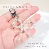 Pingente de Bolsa Popcandy Laço Coreano Franja de Pérola Chaveiro Fofo Corrente para Celular Produto Acabado