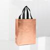 Bolsa de mano no tejida de color sólido aluminizada laminada con láser transfronteriza al por mayor bolsa de regalo bolsa de compras