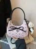 Bolsa de Verão Rosa com Laço para Axila Transfronteiriça 2025 Nova Bolsa Transversal de Alto Padrão Estilo Ballet Bolsa Baguete Fashion