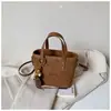 2026 Principios de Otoño Nuevo Diseño de Nicho Casual Personalidad Bolso Cruzado de un Solo Hombro Alto Valor Moda Color Sólido Bolso Cubo Tendencia