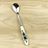 Venta al por mayor de fábrica mango de cerámica de acero inoxidable patrón floral exportación transfronteriza Amazon tamaño pequeño cuchara para remover tenedor de fruta