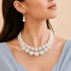 Elegante collar vintage de estilo court de doble capa con perlas de imitación y diamantes para mujer, cadena versátil y única para la clavícula