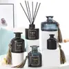 Botellas de aromaterapia vacías de alta gama al por mayor, difusores sin llama de ratán y flores secas, alto valor estético con tapa, color gris ahumado