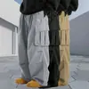 2026 Pantalones Casuales de Verano para Hombre Transfronterizos de Color Sólido con Múltiples Bolsillos Elegantes Sueltos de Pierna Recta Ropa de Trabajo Versátiles Pantalones Largos Venta al por Mayor