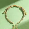 Cuerda de mano semiacabada DIY nudo de diamante tejido a mano pulsera de cuerda roja cuentas oro duro nudo de paz cuerda de mano al por mayor
