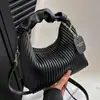 Bolsa de Mão com Listras Verticais Texturizadas Novo Estilo Outono 2026 Alça Única Plissada Bolsa Transversal Estilosa Versátil para Mulheres Venda por Atacado