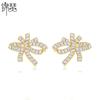 Pendientes de lazo Jinse, pendientes de circonita con incrustaciones de cobre de alta calidad, accesorios populares para banquetes nupciales de moda europea y americana.