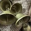 Cuerda de cáñamo con campanas de venta caliente Cadena de campanas Trompeta vintage Carrillón de viento Arte de hierro Decoración colgante DIY Posada en casa Decoración de carillón de viento para el hogar Adorno colgante