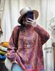 Suéter de punto de algodón con cuello semi-alto y estampado retro para mujer, diseño holgado y oversized, favorecedor para la figura, top tipo jersey casual y elegante para otoño
