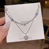 Collar apilable de doble capa con estrella de cinco puntas de circonita, Cadena para clavícula dulce y elegante con cuentas de cristal azul, Cadena para el cuello de lujo ligero y exquisita