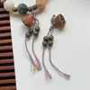 Venta al por mayor madera de durazno natural dosel de loto pequeño sándalo verde pulsera diy colgante ropa ropa colgante para teléfono móvil productos semiacabados