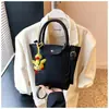 Bolso de Hombro de Moda Transfronterizo para Mujer 2025 Nuevo Diseño de Combinación de Colores Bolso de Mano Versátil para Viajes Diarios y Salir Bolso Cruzado