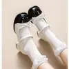 Sapatos femininos de couro estilo britânico com salto grosso e laço 2026 novo estilo versátil de verão para combinar com saias bico redondo sapatos Mary Jane