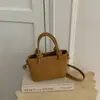 Bolso de Mano Tejido de Nueva Moda Otoño 2026 Alta Apariencia Calidad Textura Personalidad Bolso Cuadrado Pequeño Color Sólido Bolso de Hombro Único Cruzado