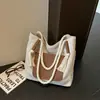 Bolsa de ombro única com atmosfera minimalista japonesa, sensação preguiçosa e relaxada, mochila casual, bolsa de mão para o trajeto diário do trabalhador de escritório