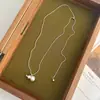 Elegante y Sofisticado Monedero Metálico Colgante de Calabaza Collar, Cadena Larga de Suéter Moderna y Extensible, Estilo Versátil Coreano para Mujer
