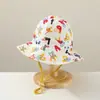 Sombrero de pescador para bebé al por mayor moda estampado pequeño fresco sombrero para el sol dos lados disponibles sombrero para niños versión coreana