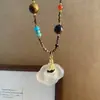 Nuevo collar colgante de nube auspiciosa estilo retro chino versátil de jadeíta blanca, una cadena de clavícula de alta gama para verano