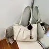 Bolsa tote vintage transfronteiriça para mulheres, novo modelo de início de outono de 2026, bolsa de mão simples de grande capacidade, bolsa de ombro elegante e versátil