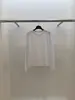 Edição Coréia Dongdaemun 2026 Primavera Nova T-shirt de Cor Sólida com Costura nas Costas Gola Redonda Manga Longa para Mulheres