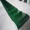 Cinta transportadora con deflectores verdes del fabricante original, con faldón de material de PVC, antideslizante