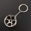 [Jiayi] Llavero de modificación de coche transfronterizo redondo hierba de cinco hojas rueda de loto aleación de zinc accesorios metal
