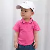 Polo para bebé para niños y niñas estilo coreano de manga corta de algodón fino camiseta de bebé top de verano una pieza entrega