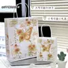 Bolsa de Papel Kraft Rosa Polvo Pequeña y Mediana Día del Niño Linda Portátil Bolsas Exquisitas ins Bolsa de Regalo para el Festival de la Diosa