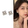 Pendientes de camelia tridimensionales de doble cara en blanco y negro para mujer, diseño avanzado de nicho, 2024
