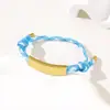 Al por mayor al contado transfronterizo Pulsera de doble cordón de ajuste Pulsera de cuerda trenzada ajustable de acero inoxidable multicolor con impresión y grabado de color UV