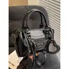 Bolso Pequeño de Alta Gama de Moda para Mujer 2026 Nuevo Modelo Bolso Resistente de Motociclista Bolso Cruzado Popular de Venta Caliente Bolso de Mano Bolso Almohada