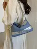Nuevo modelo 2026 bolso de hombro de gran capacidad para mujer, adecuado para viajes y desplazamientos, bolso cruzado, bolsa de axila tipo 'dumpling' para uso diario