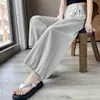 Pantalones cropped de pierna ancha con ribete de encaje para mujer, nuevo estilo 2026, holgados y ligeros, adecuados para figuras petite, pantalones casuales protectores del sol en gris