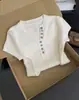 Camiseta de punto hueco azul estilo francés de seda helada de manga corta para mujer, verano, petite, única, chic, súper elegante, top de hombro normal