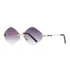 Nuevo marco sin marco gafas de sol transfronterizas para mujer forma de diamante gafas degradadas famosas en internet borde sin marco gafas de moda al por mayor