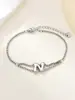 Nuevo Anillo de Acero Inoxidable al por Mayor Transfronterizo 26 Letras Inglesas Anillo de Doble Capa Pulsera Chapada en Oro