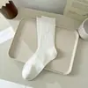 Meias de algodão penteado femininas confortáveis respiráveis versáteis primavera e verão finas cor sólida boca larga losango meia de cano médio sem costura feminina atacado