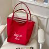 2025 Nuevo Modelo Cruzada Roja Gran Capacidad Lona Rayada Estilo Coreano Estilo Perezoso Portátil Hombro Tote Bolsa de Compras