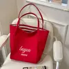 Bolsa de punto a rayas estilo perezoso de primavera y verano, estilo coreano para chicas, moda moderna, bolsa de compras de gran capacidad, bolsa tipo tote