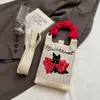 Bolso de Mano de Punto de Nuevo Estilo Color Dopamina Bolso de Almacenamiento Versátil de Nicho Bolso Pequeño de Punto Cruzado