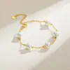 Pulsera de Perla de Imitación de Oro de 18 Quilates Cadena de Perlas Doradas de Acero Inoxidable Accesorio Sencillo Delgado para el Trabajo Joyería Transfronteriza Europea y Americana