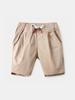 Comercio exterior transfronterizo verano nuevo bebé color sólido pantalones cortos decoración de cordón falso moda niños pantalones cortos casuales venta al por mayor