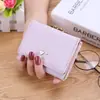 Carteira de celebridade da internet feminina estudante do ensino médio estilo coreano curta pequena carteira moda Mini Carteira de moedas tripla dobrável porta-cartões de uso duplo feminina