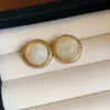 Brincos irregulares de resina com agulha de prata e design oco, estilo simples e único, sensação luxuosa e de alta qualidade, brincos exagerados atacado