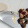 2025 Nuevo Collar de Perlas Francesas para Mujer Diseño de Nicho Cadena para Clavícula de Circonita Estrella de Cuatro Puntas Cadena Versátil para Suéter