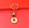 Se puede hacer tú mismo con cuerda roja creativa, cinco monedas de emperador, accesorios semiacabados para llaveros, accesorios para bolsos, colgante para coche, generación